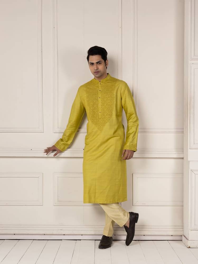 Moss green embroidered kurta paired with pants