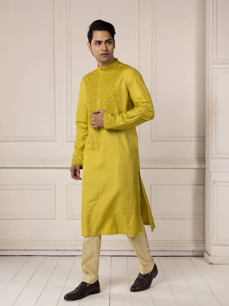 Moss green embroidered kurta paired with pants
