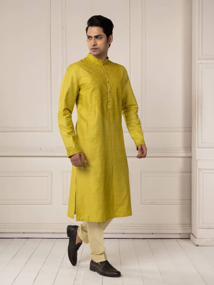 Moss green embroidered kurta paired with pants
