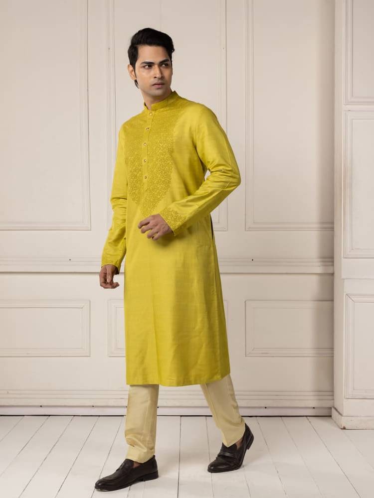 Moss green embroidered kurta paired with pants