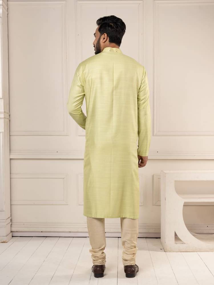 Pastel green kurta with gota work paired with churidar