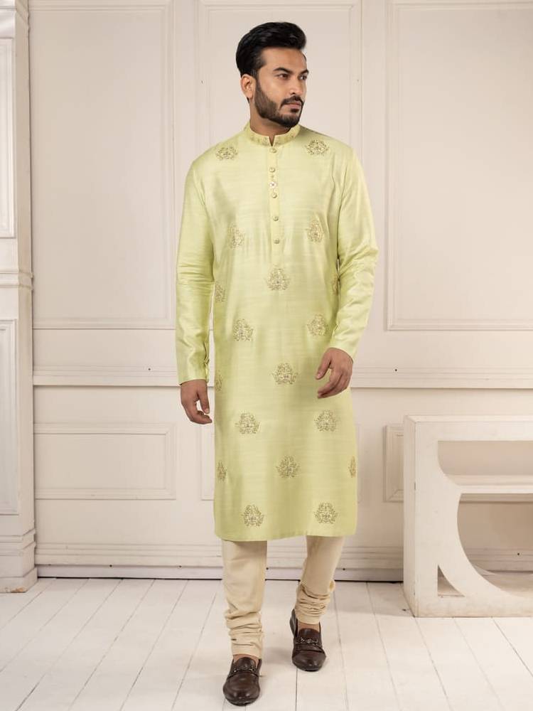 Pastel green kurta with gota work paired with churidar