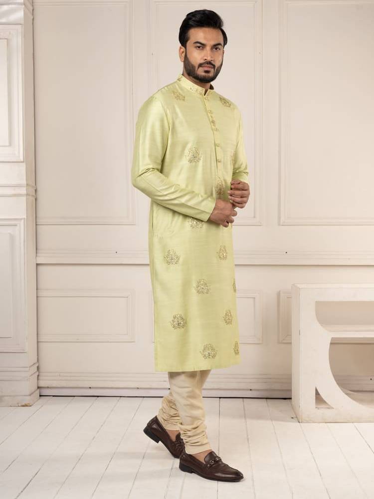 Pastel green kurta with gota work paired with churidar