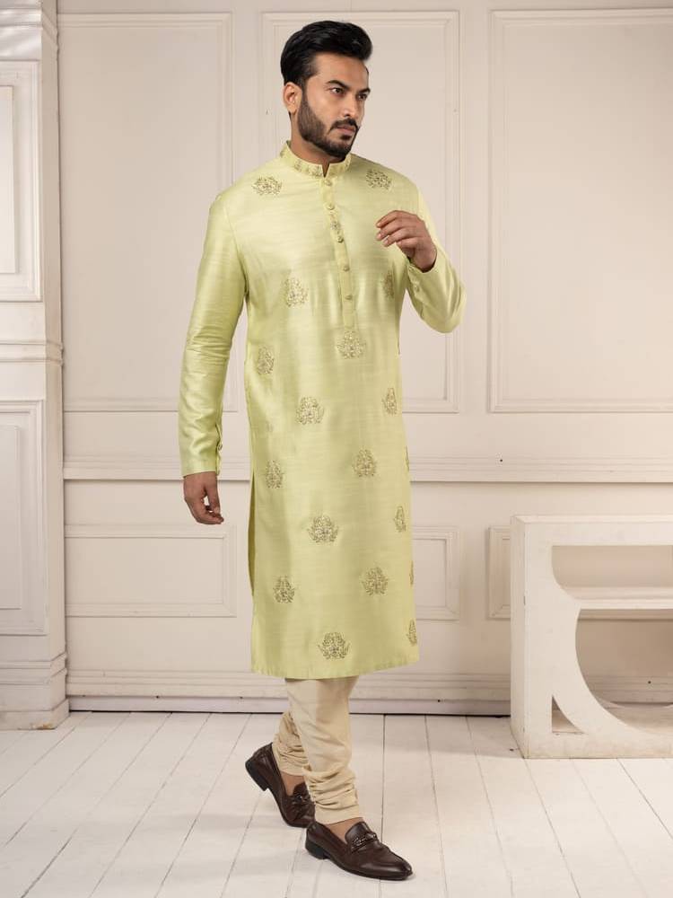 Pastel green kurta with gota work paired with churidar