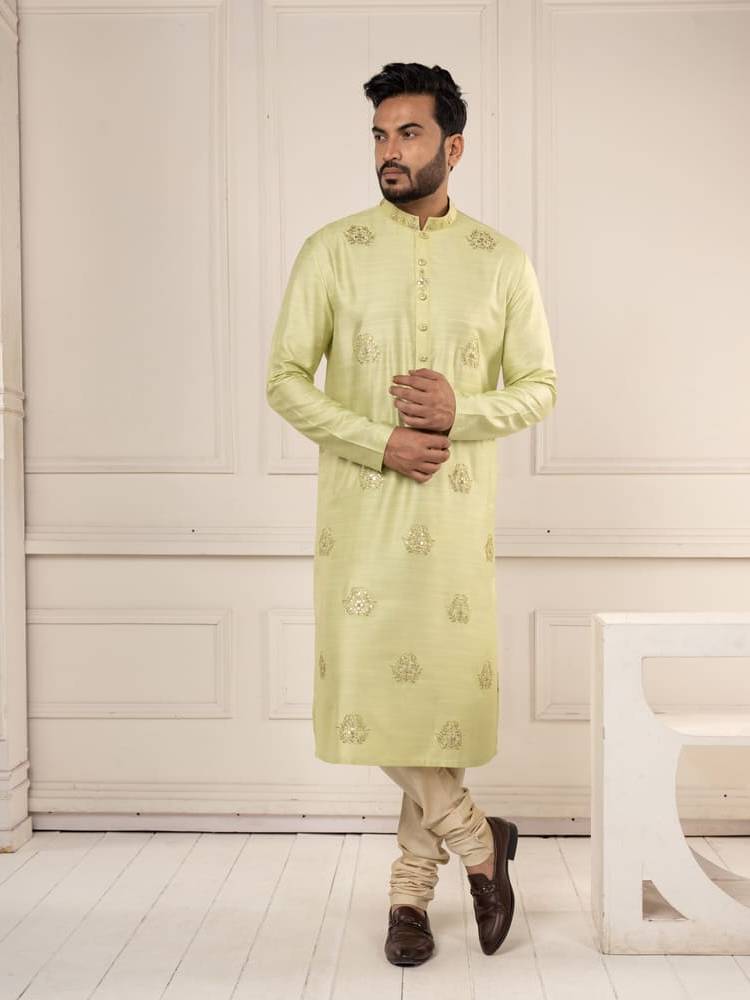 Pastel green kurta with gota work paired with churidar