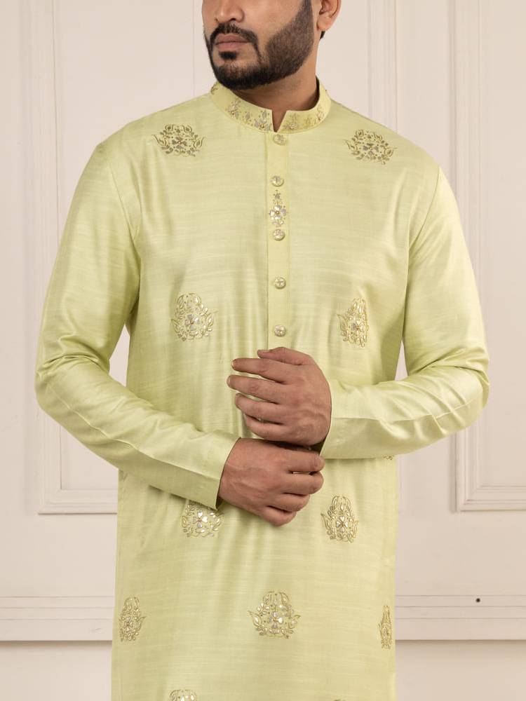 Pastel green kurta with gota work paired with churidar
